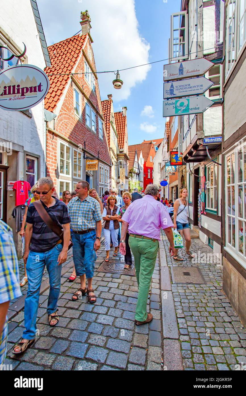 Bremen, Germany - August 17, 2012:  Walking people in the shopping stereet in the Old town of Bremen Stock Photo