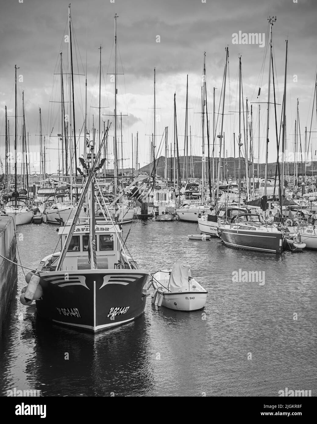 Golf del Sur, Tenerife, Spain - December 7, 2019: Sail yachts and boats at Marina San Miguel. Black and white photography Stock Photo