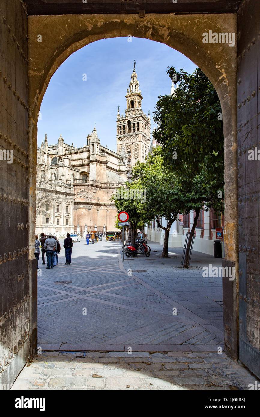 Seville, Spain - March 15, 2013: View of Seville Cathedral through old gate Stock Photo