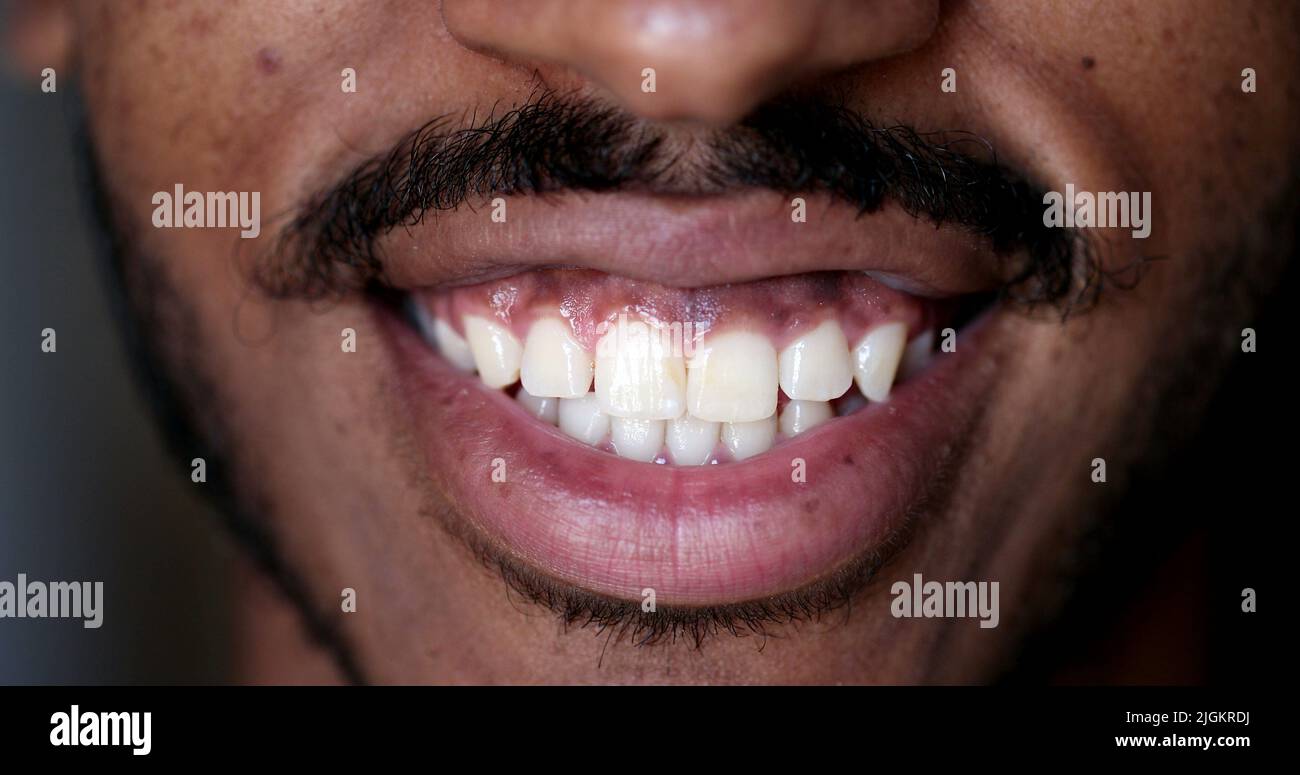 Smiling black man lips close hi-res stock photography and images - Alamy