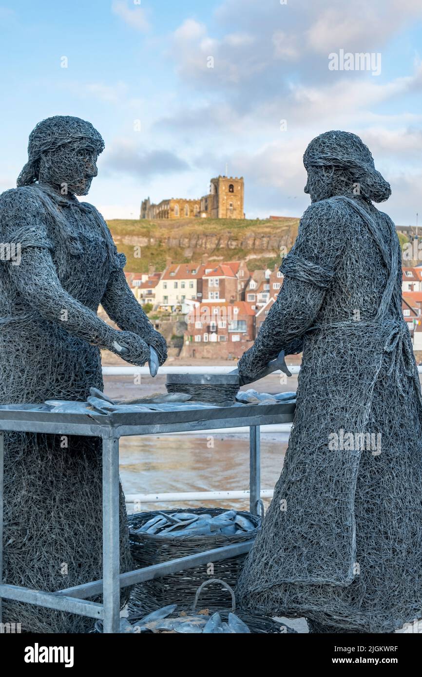Sculptures of Herring Girls, Whitby in North Yorkshire.. Sculptures by Emma Stothard. as part of the Whitby Heritage trail Stock Photo