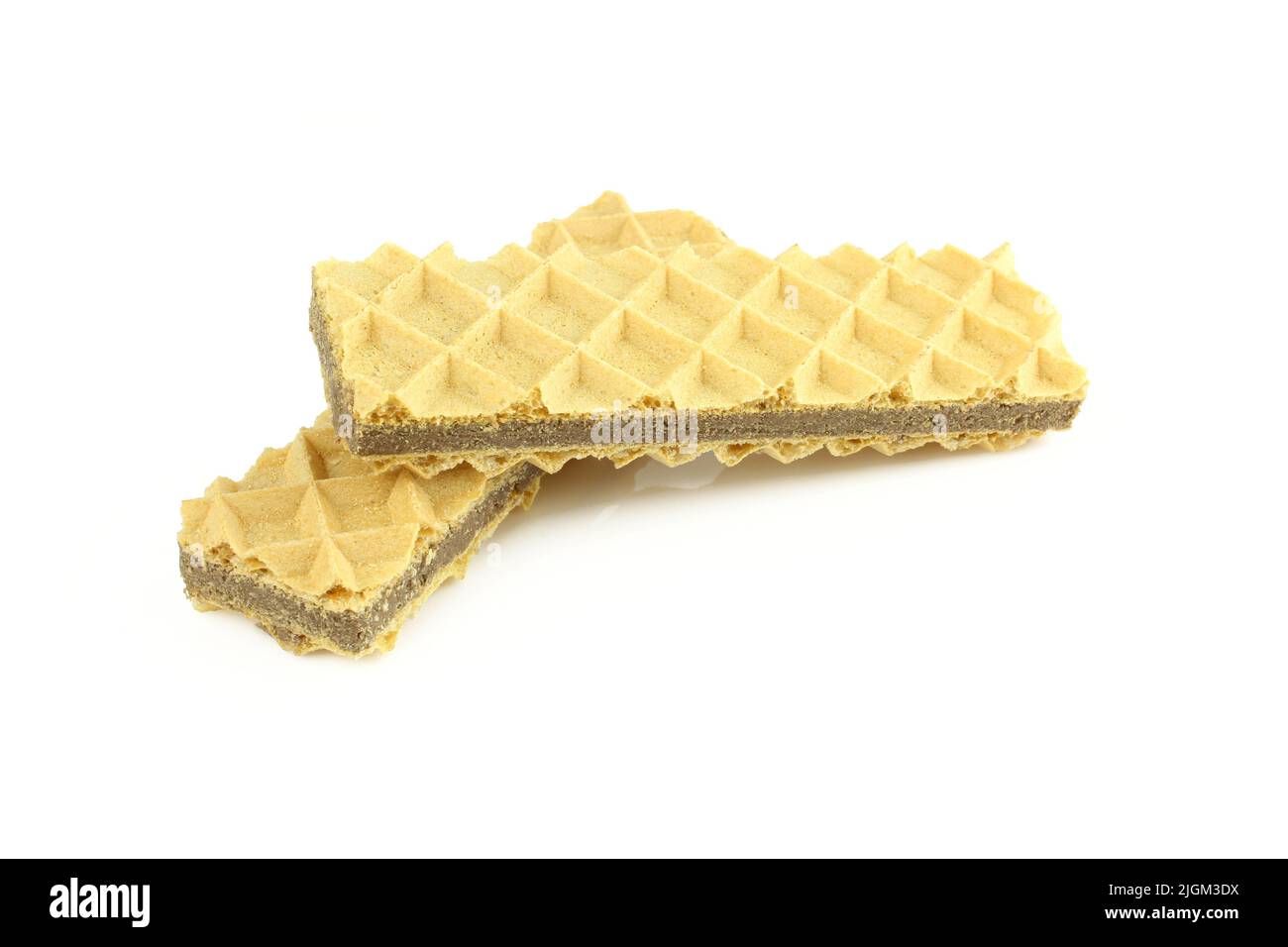 Two sticks of chocolate and hazelnut filled wafers isolated on white