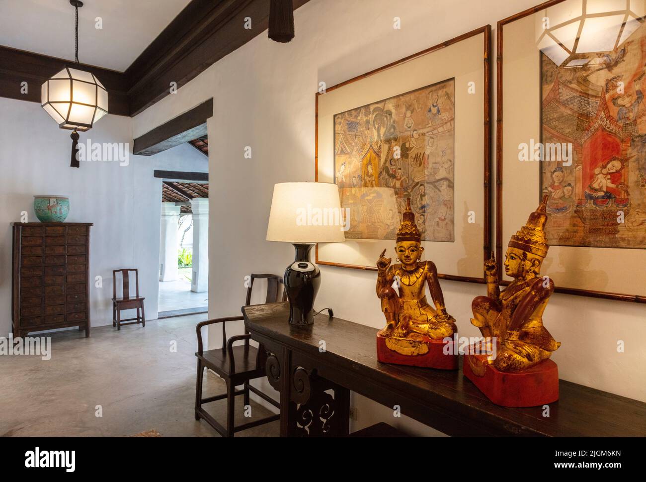 Interior hallway with traditional art at luxurious Rachamankha Hotel in CHIANG MAI, THAILAND Stock Photo