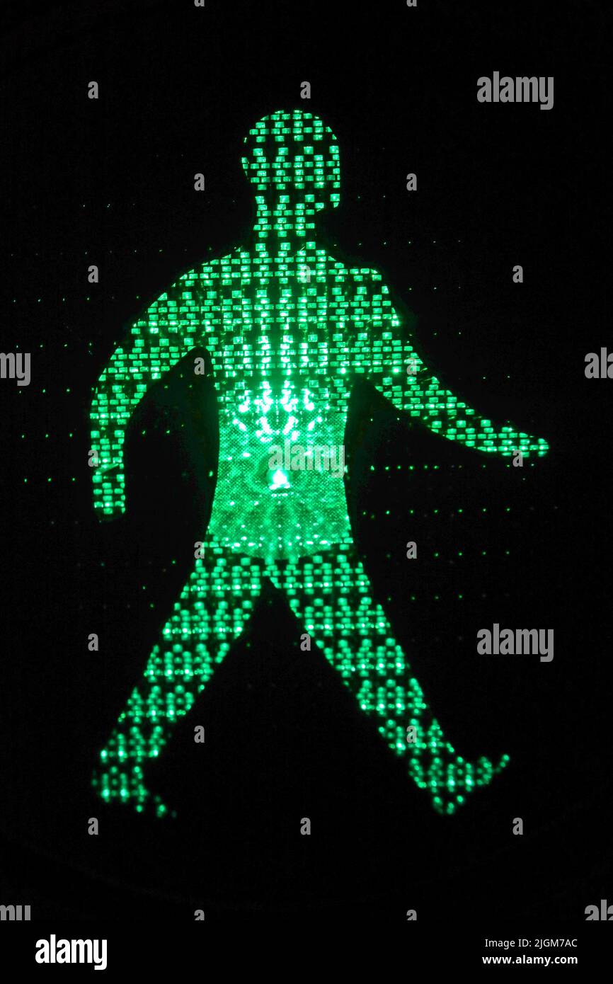 Pedestrian traffic signal Green for cross now walk England, Great