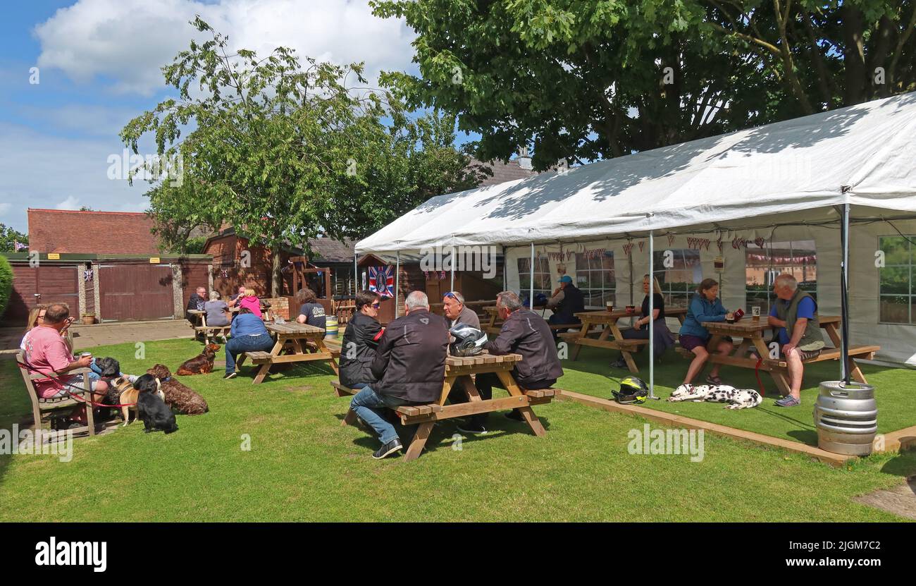 Real ale beer garden at Appleton Thorn Village Hall, Stretton Rd, Appleton Thorn, Warrington, Cheshire, England, UK,  WA4 4RT Stock Photo