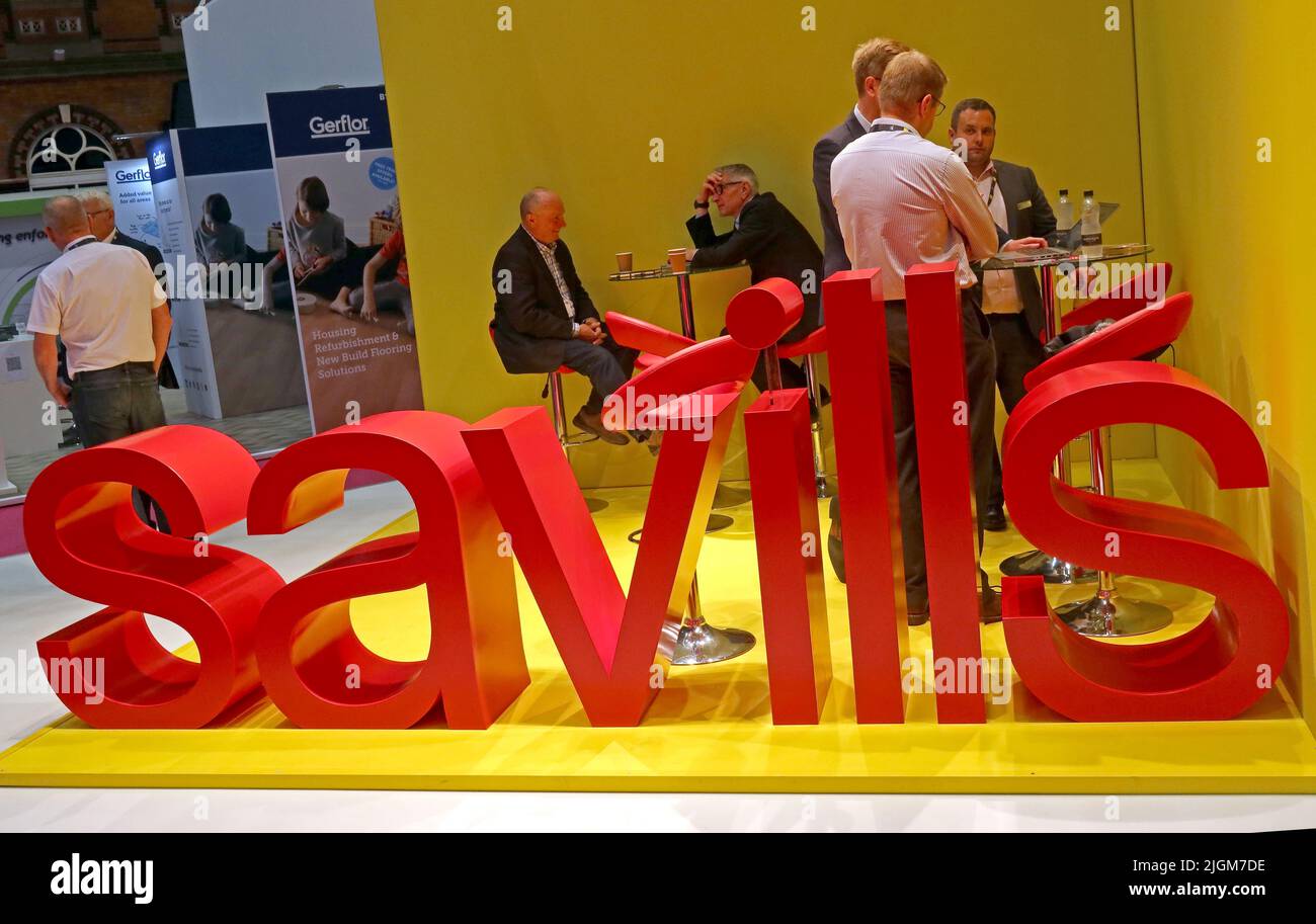 Savills stand at Housing2022,CIH Housing event,conference and exhibition held at Manchester Central (GMEX),in partnership with Ocean Media, England,UK Stock Photo
