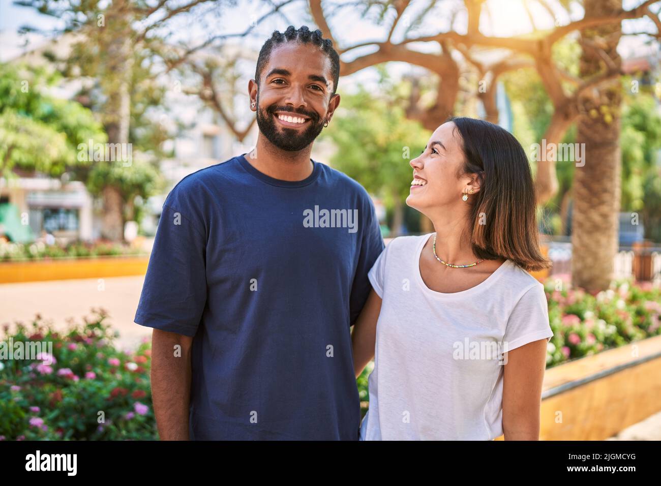 Man and woman couple smiling confident hugging each other at park Stock ...