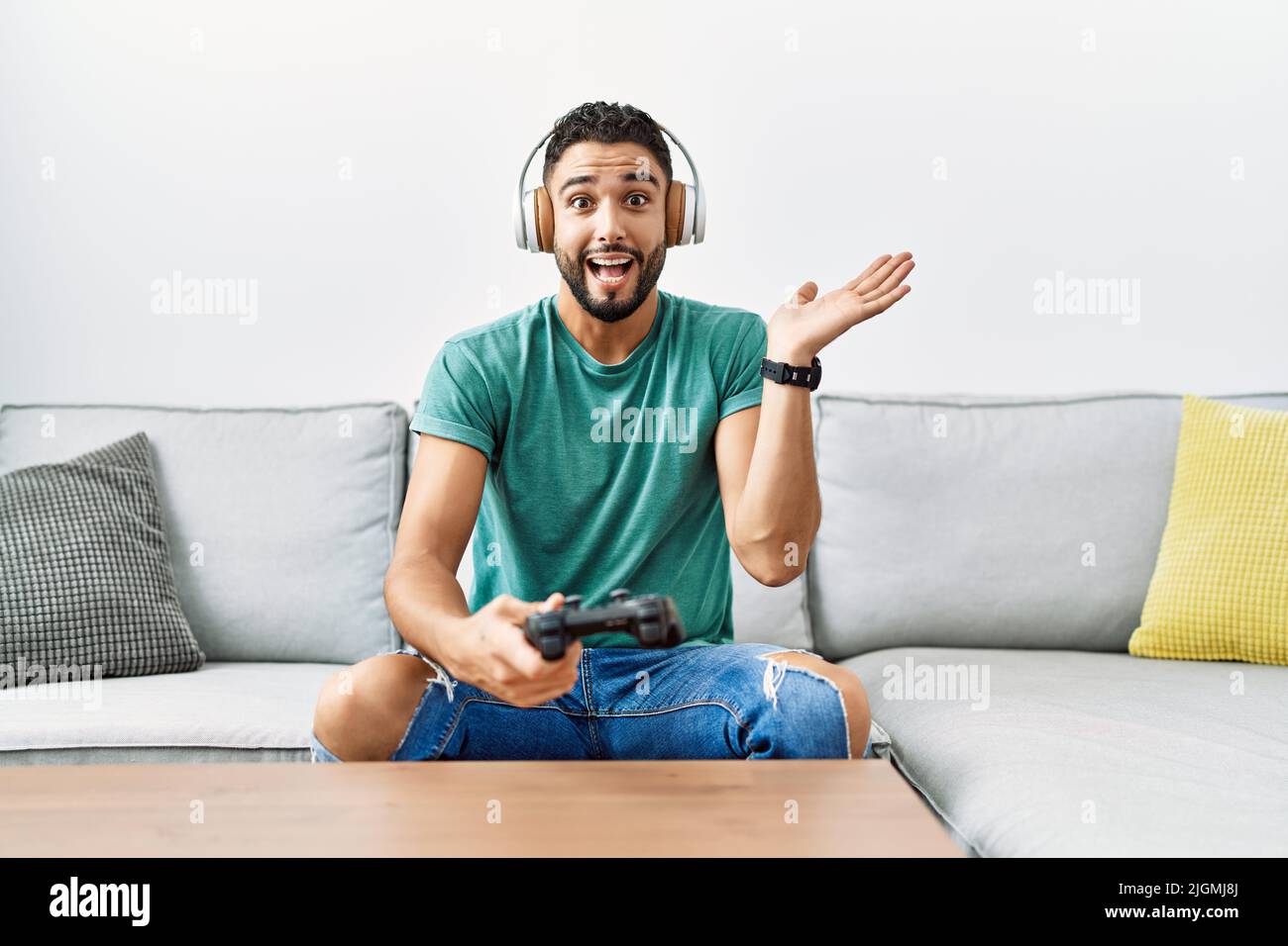 Gaming Controller In Hand Gif By Art4ever Background, 3d Cartoon Hand  Holding A Virtual Reality Headset And Holding A Controllers With The Other  Hand, Hd Photography Photo, Game Background Image And Wallpaper