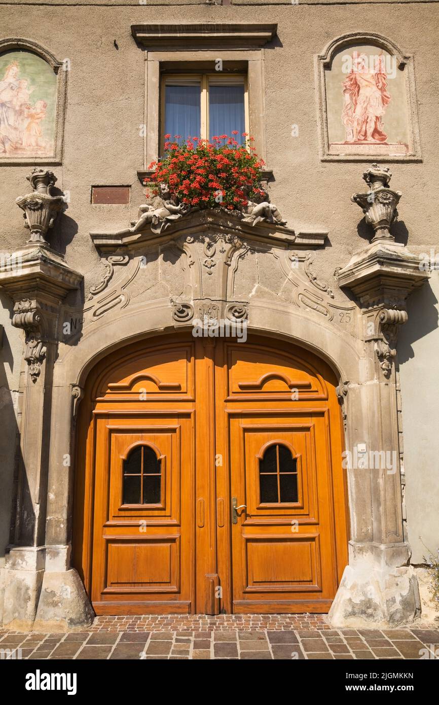 Building facade with arched wooden doors in Eisenstadt, Burgenland