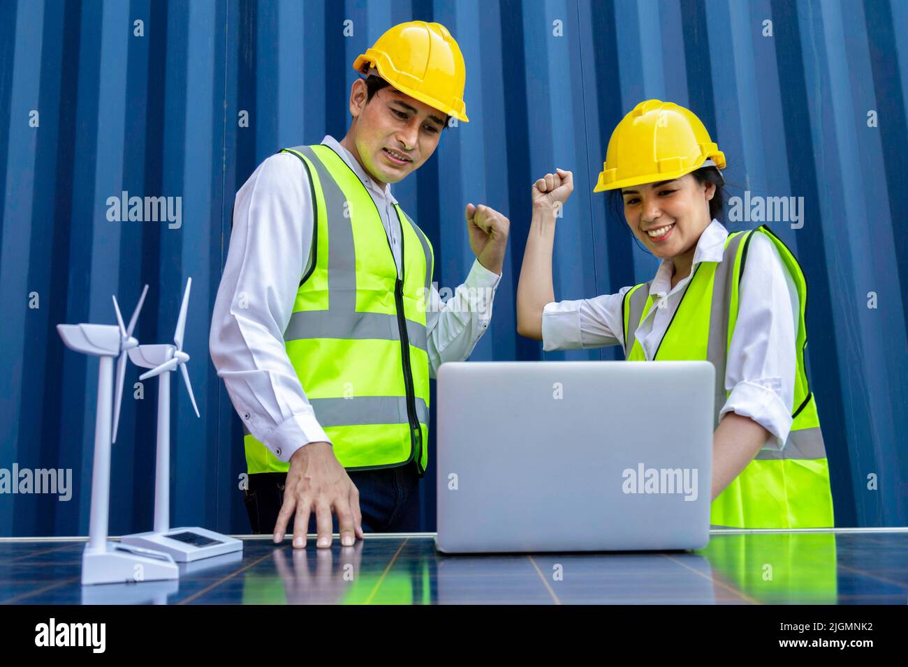 young asian man and woman university students learning and experimental wind and sunlight renewable energy in engineering, bachelor of science, renewa Stock Photo
