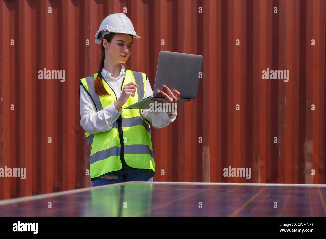 young caucasian woman university student learning and experimental to set up programing solar cell renewable energy in engineering, bachelor of scienc Stock Photo