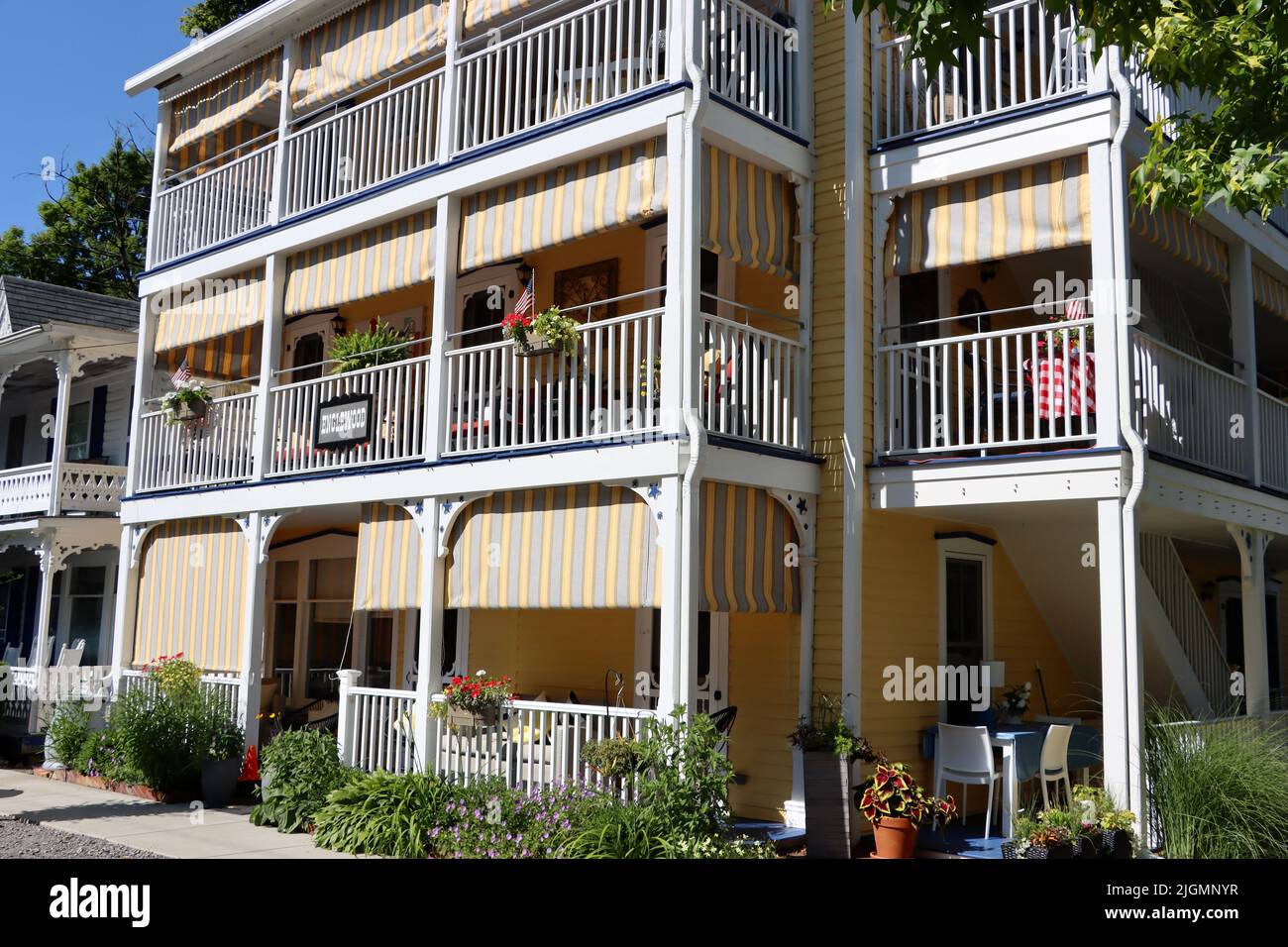 Yellow multistory building with balconies at Chautauqua Institution