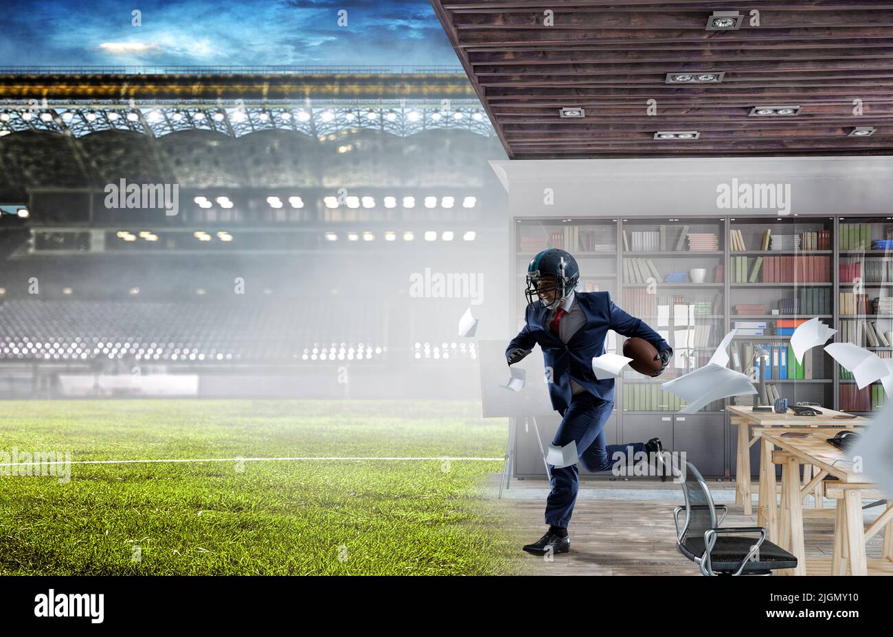 Businessman acting as american football players Stock Photo Alamy