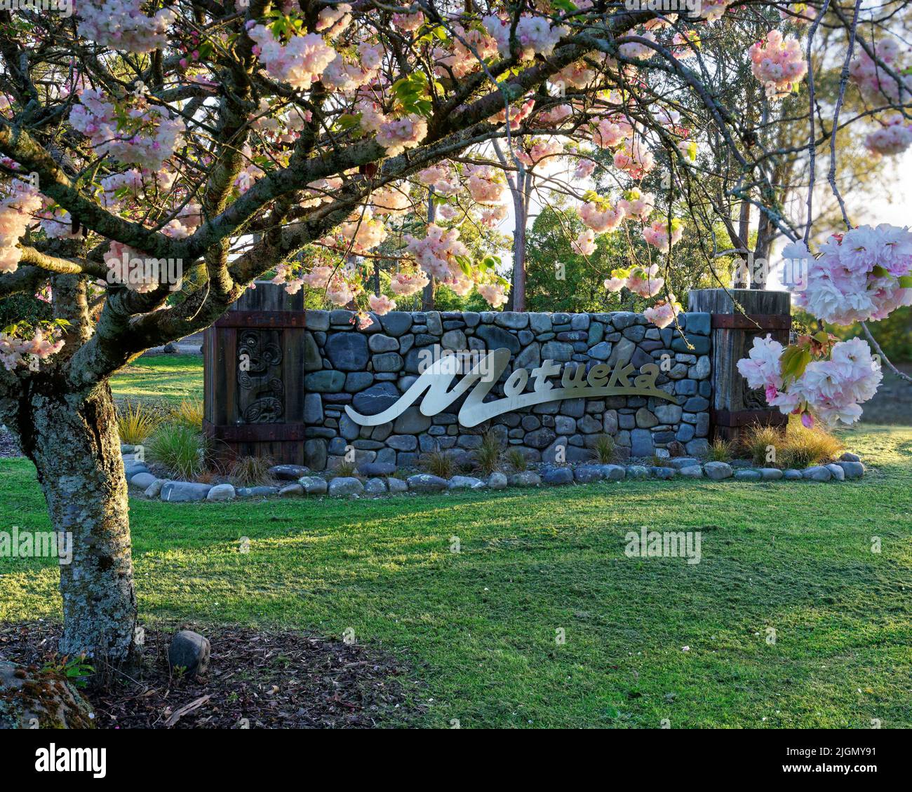 Motueka sign in the spring blossom, Motueka, Tasman region, south island, Aotearoa / New Zealand Stock Photo