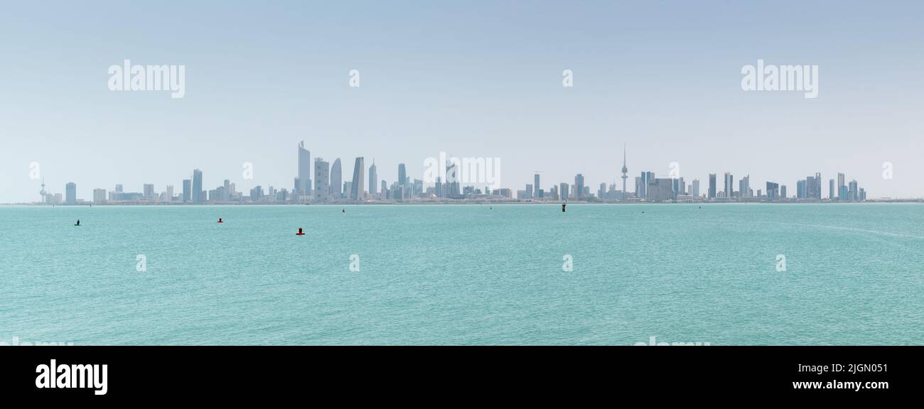 Kuwait City, Kuwait - July 7 2022: A panoramic view of Kuwait City with the Arabian Gulf in the foreground Stock Photo