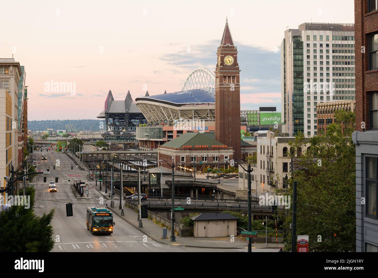 Seattle - July 09, 2022; Dawn light across King Street Station and the stadiums in Seattle Stock Photo