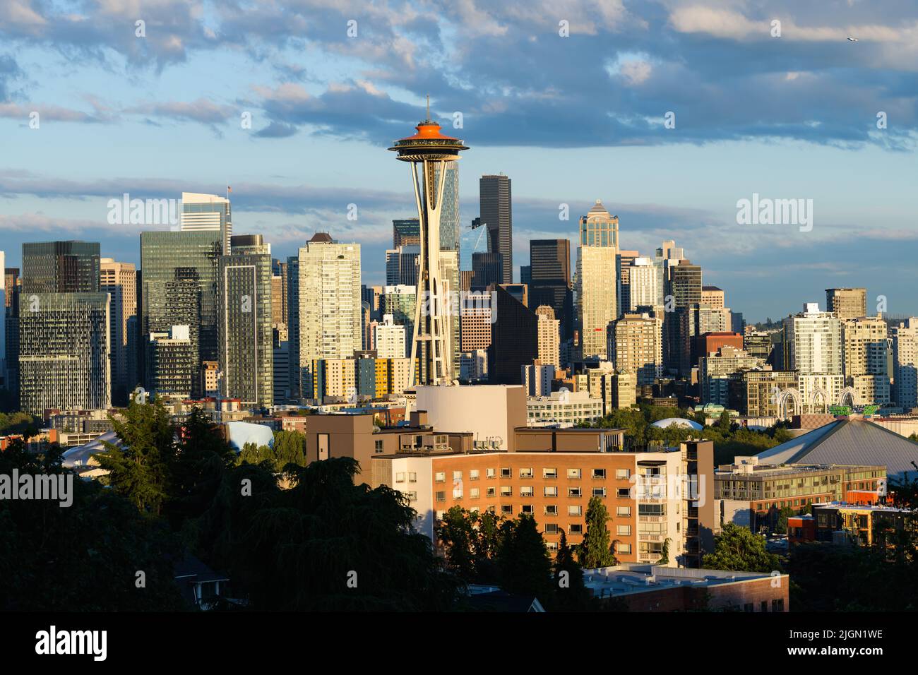 Seattle - July 08, 2022; Cityscape of the city of Seattle skyline on a summer evening with the Space Needle dome painted in orange Stock Photo