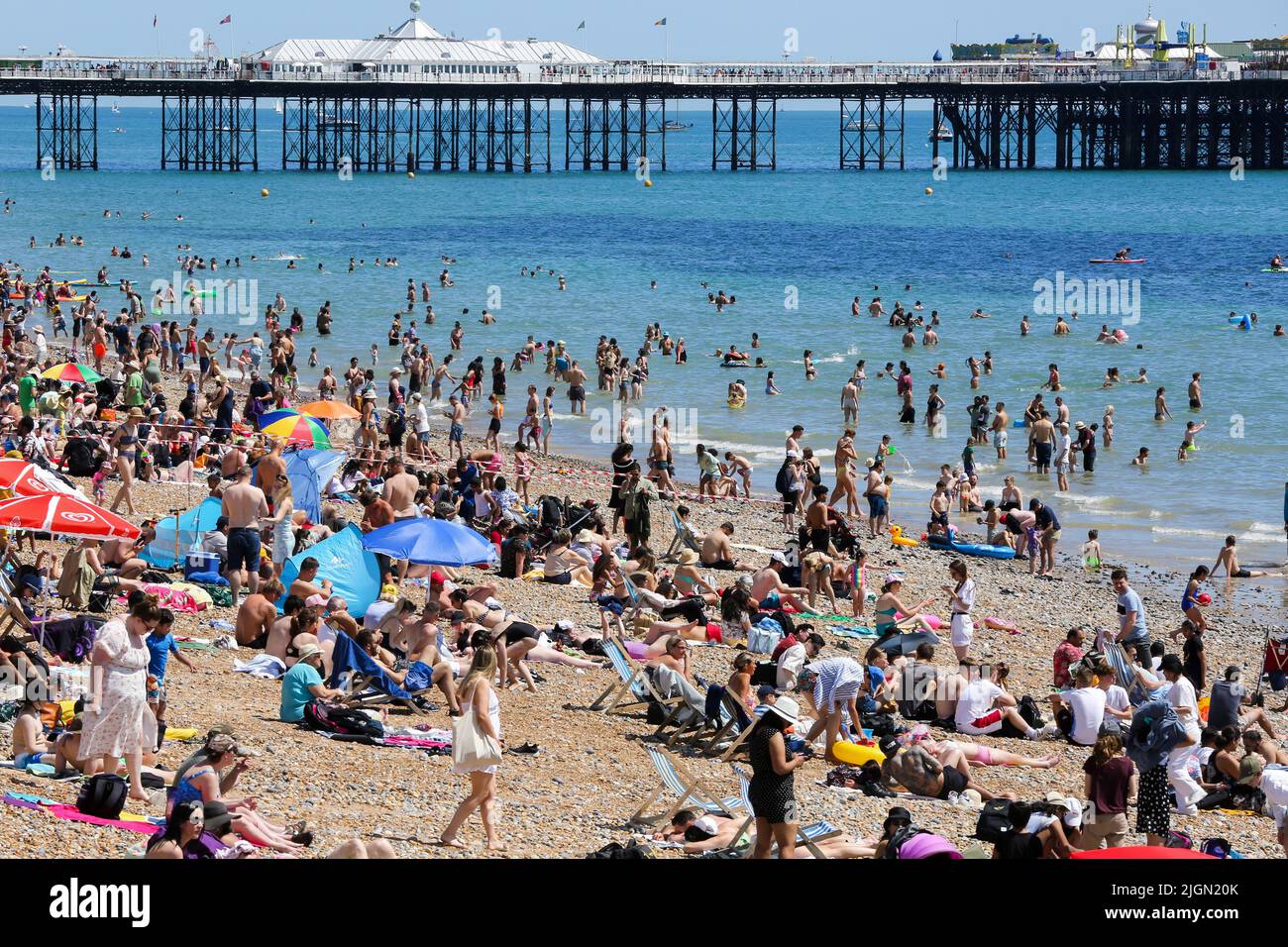 Sunbathers enjoy the beach in brighton hi-res stock photography and images  - Alamy