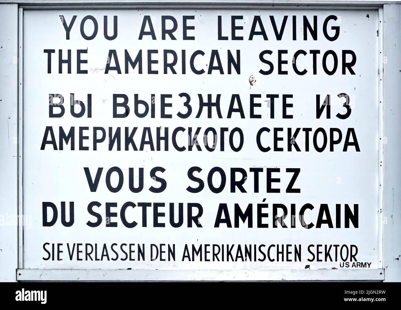 Berlin, Germany, June 20, 2022: Warning sign at the demarcation line in Berlin at check point charlie for leaving the American sector Stock Photo