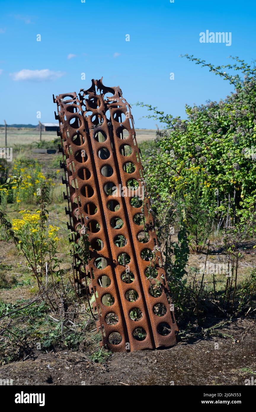 A section of Marston Mat or pierced steel planking from World War 2 on the nature reserve at Orford Ness, Orford, Suffolk. UK Stock Photo