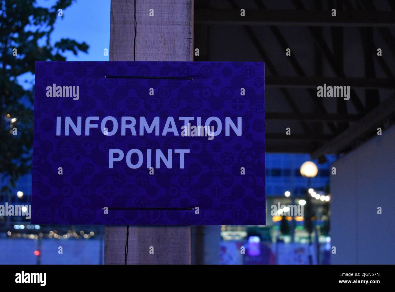 A sign at the Fan Zone for the UEFA Women's Euro 2022: 'Information Point' with copyspace. Stock Photo