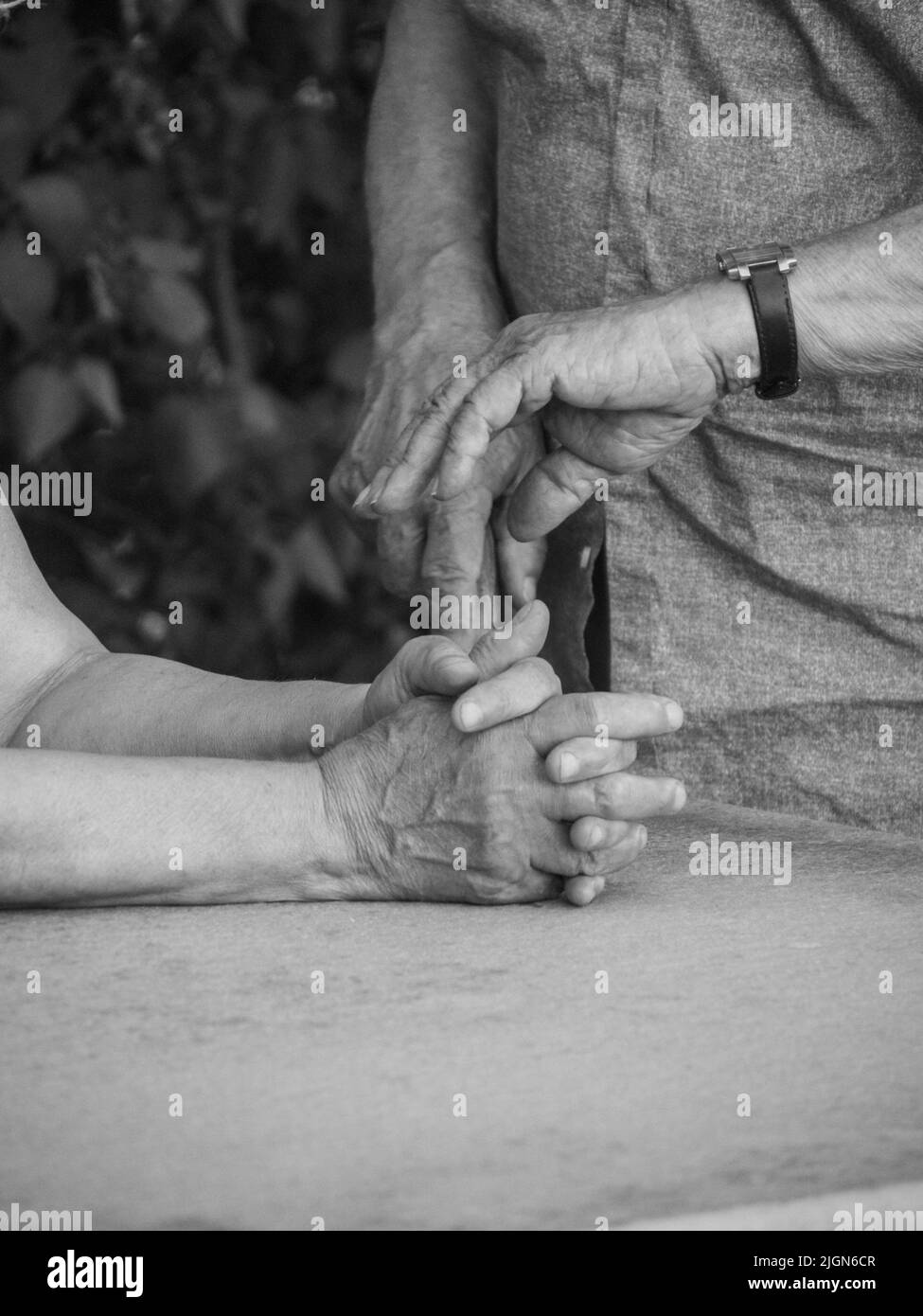 close up of wrinkled male old man on a sky pole Stock Photo