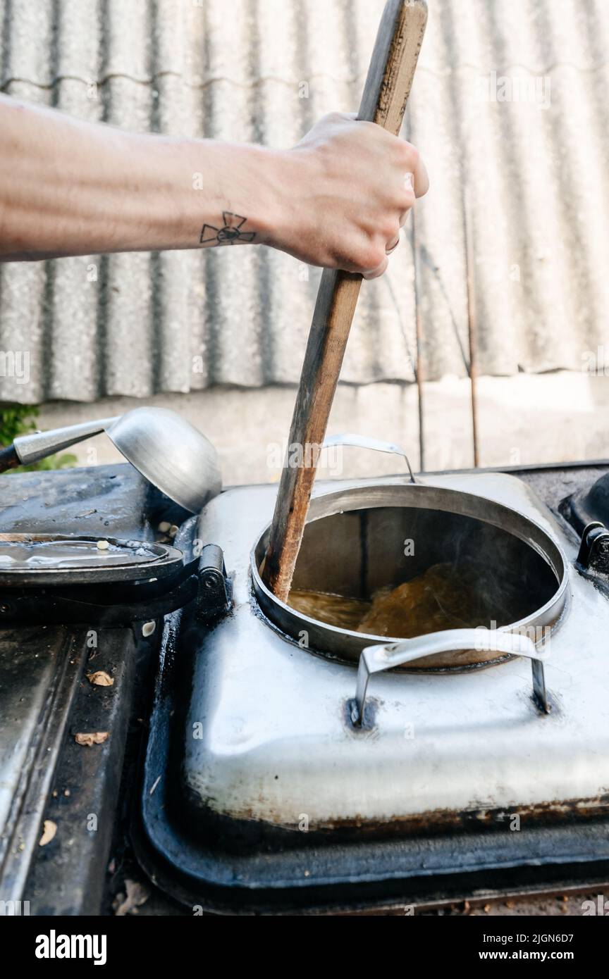 Cooking in the field during the war, field kitchen of the Ukrainian military, a detailed kitchen plan. Stock Photo