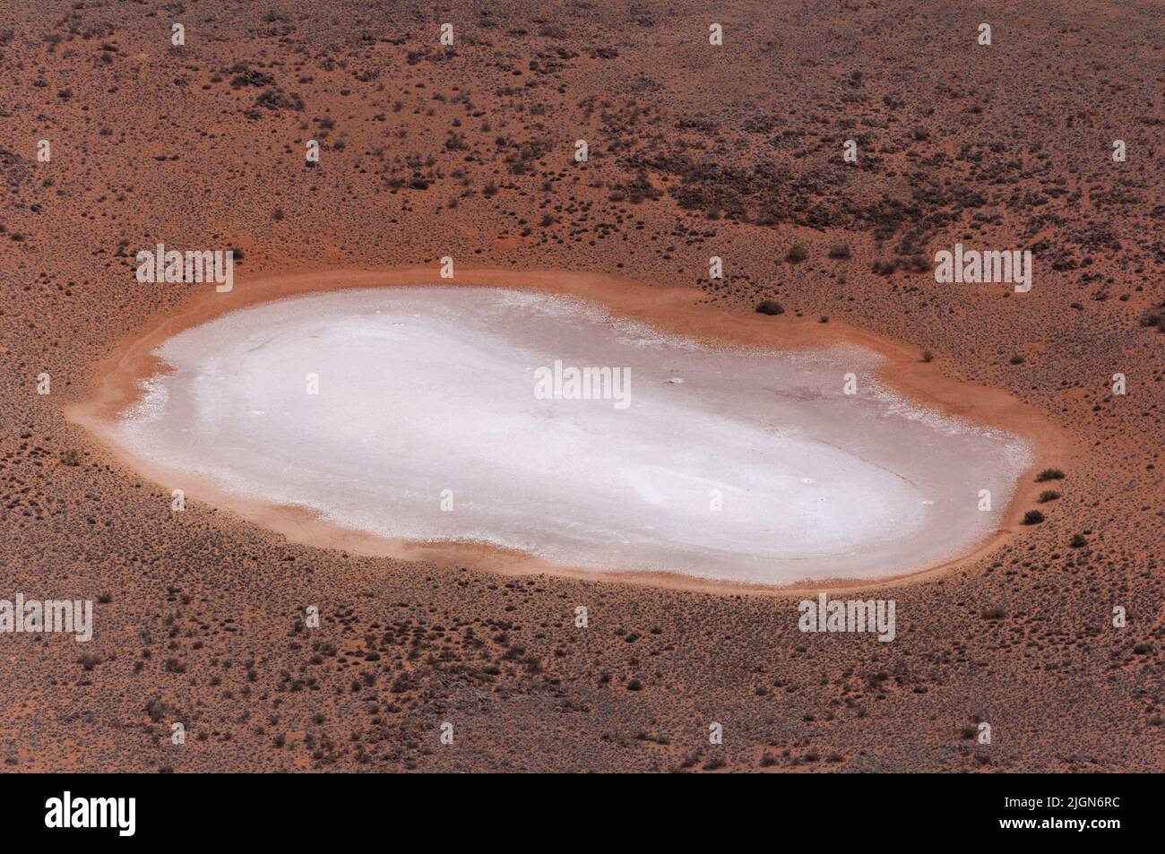 A photograph of one of many small salt pans scattered around the Northern Cape, taken whilst on a helicopter flight from Kimberley to Nuwerus, Wester Stock Photo