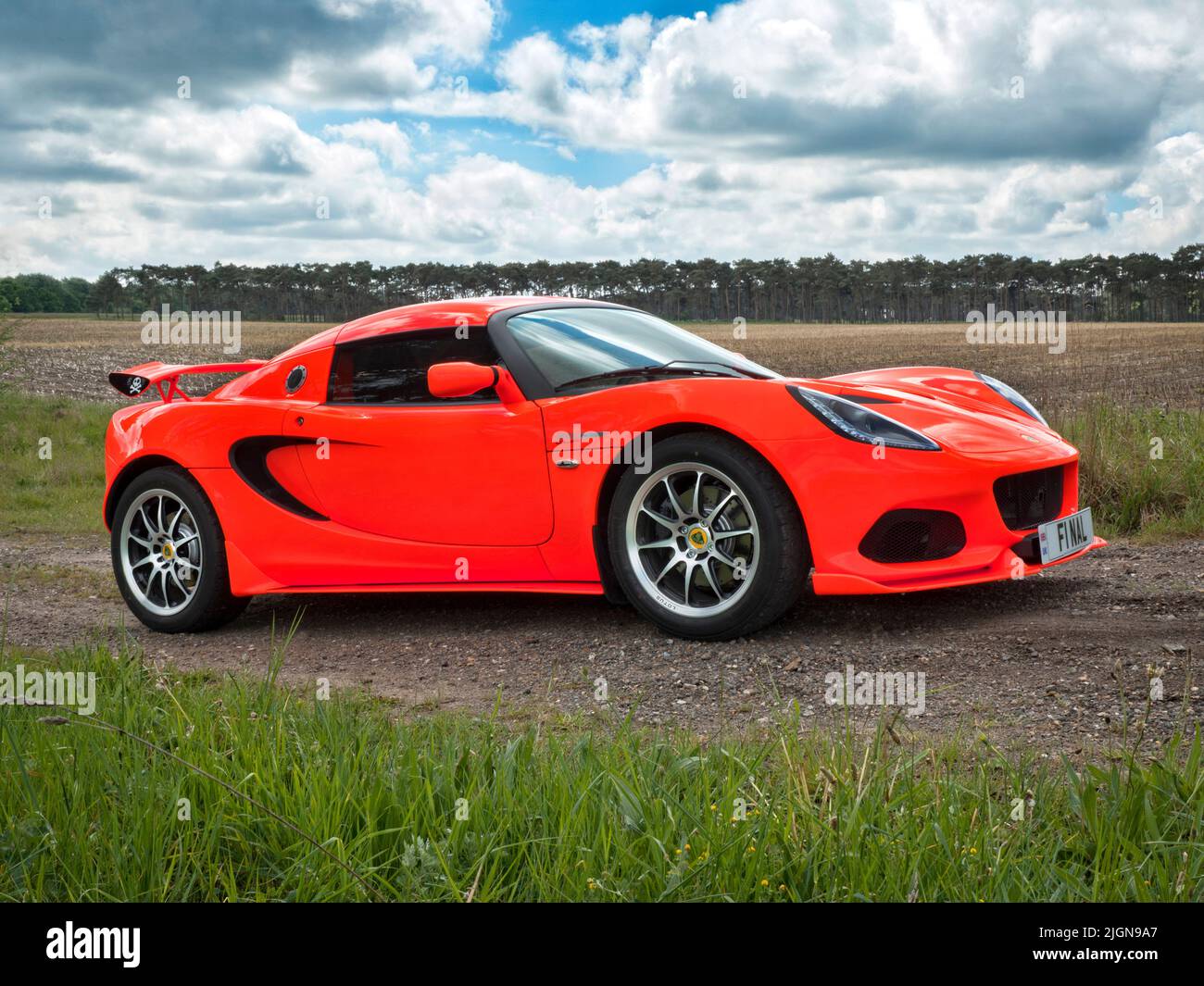 The final Lotus Elise 250 Cup painted in day glow orange. Stock Photo