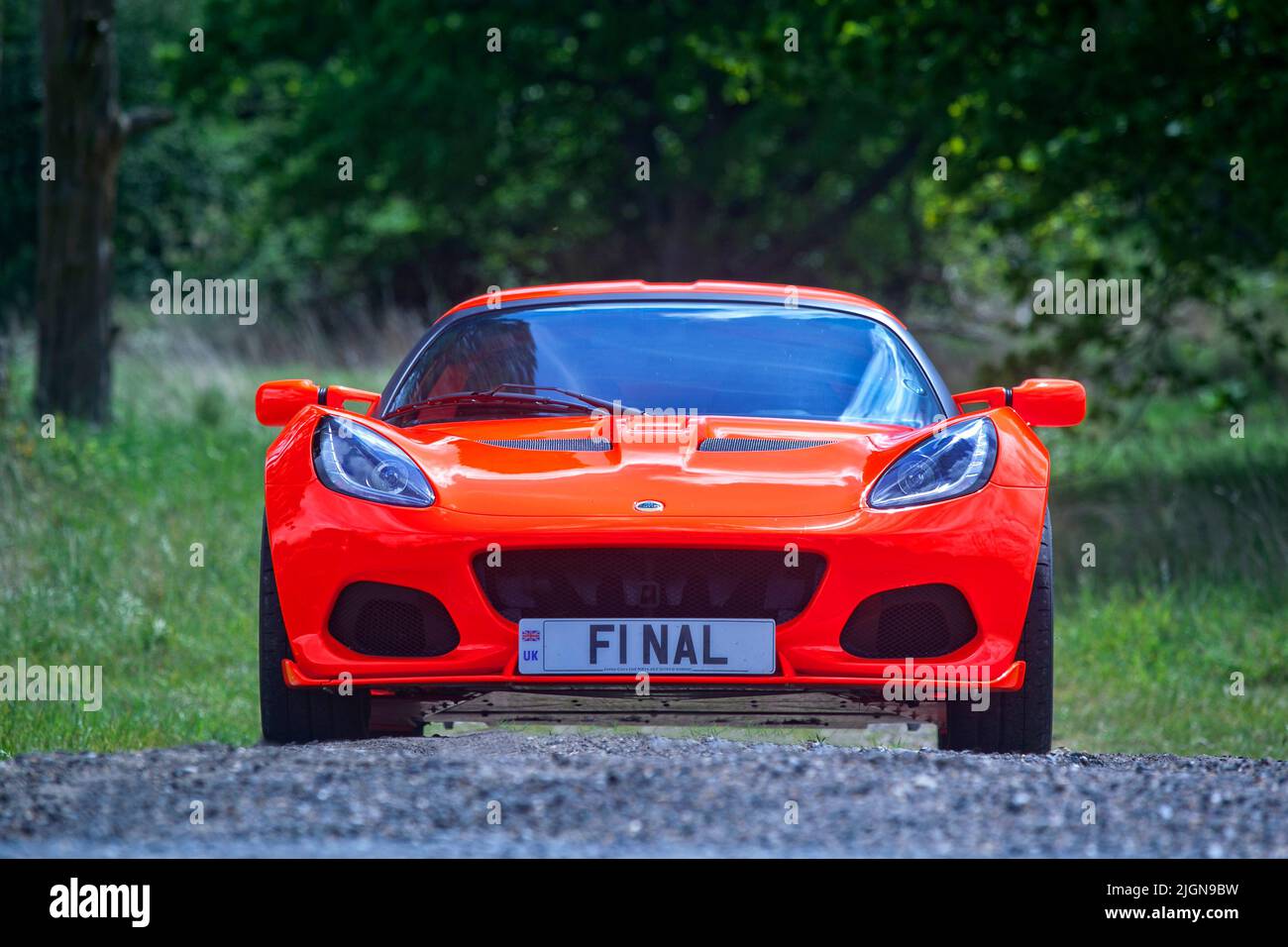The final Lotus Elise 250 Cup painted in day glow orange. Stock Photo