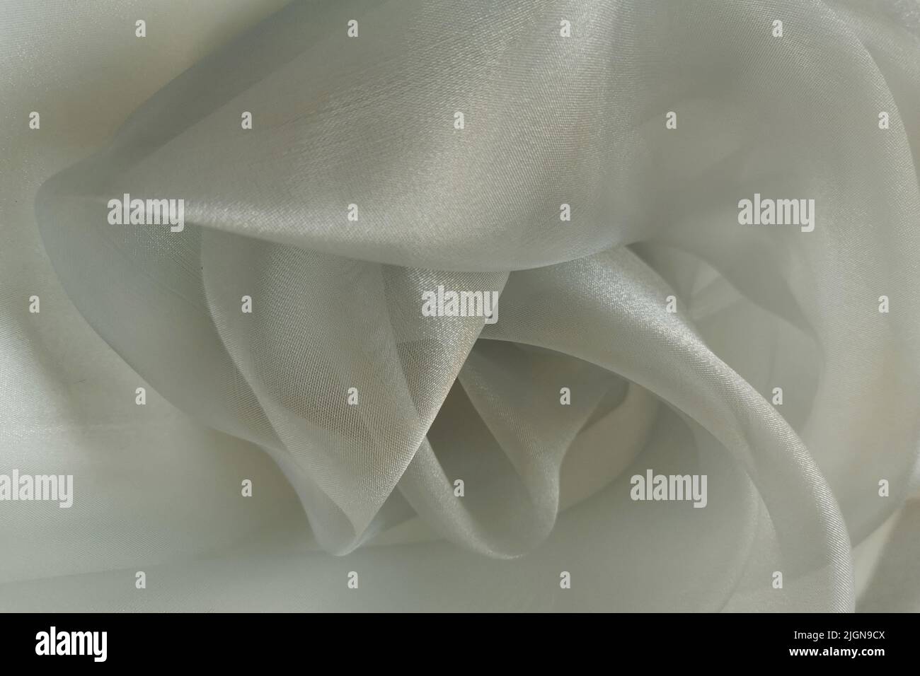 Gray or green organza fabric. Crumpled or wavy fabric texture ...