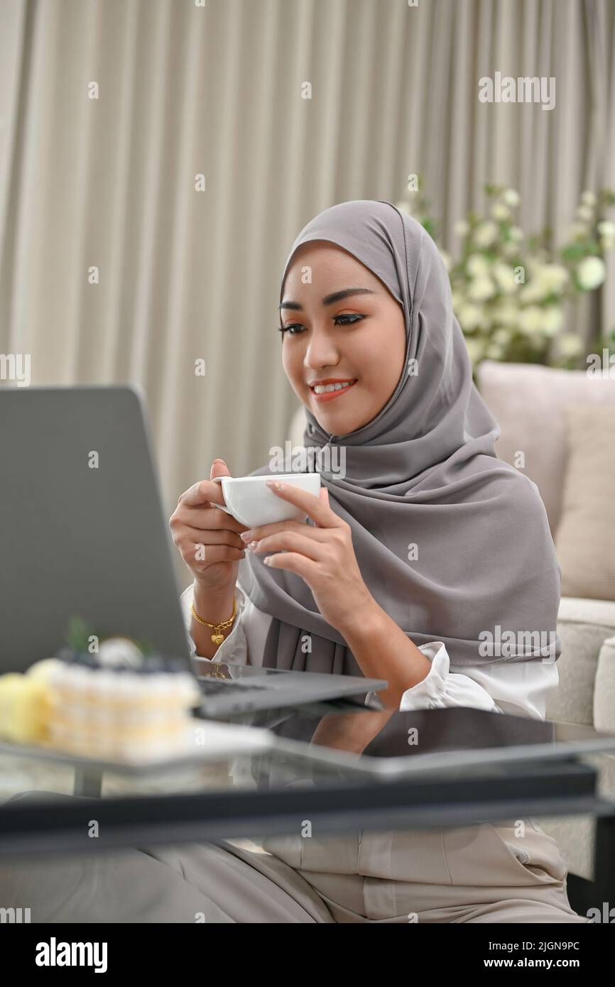 Arab woman drinking coffee in hi-res stock photography and images - Alamy