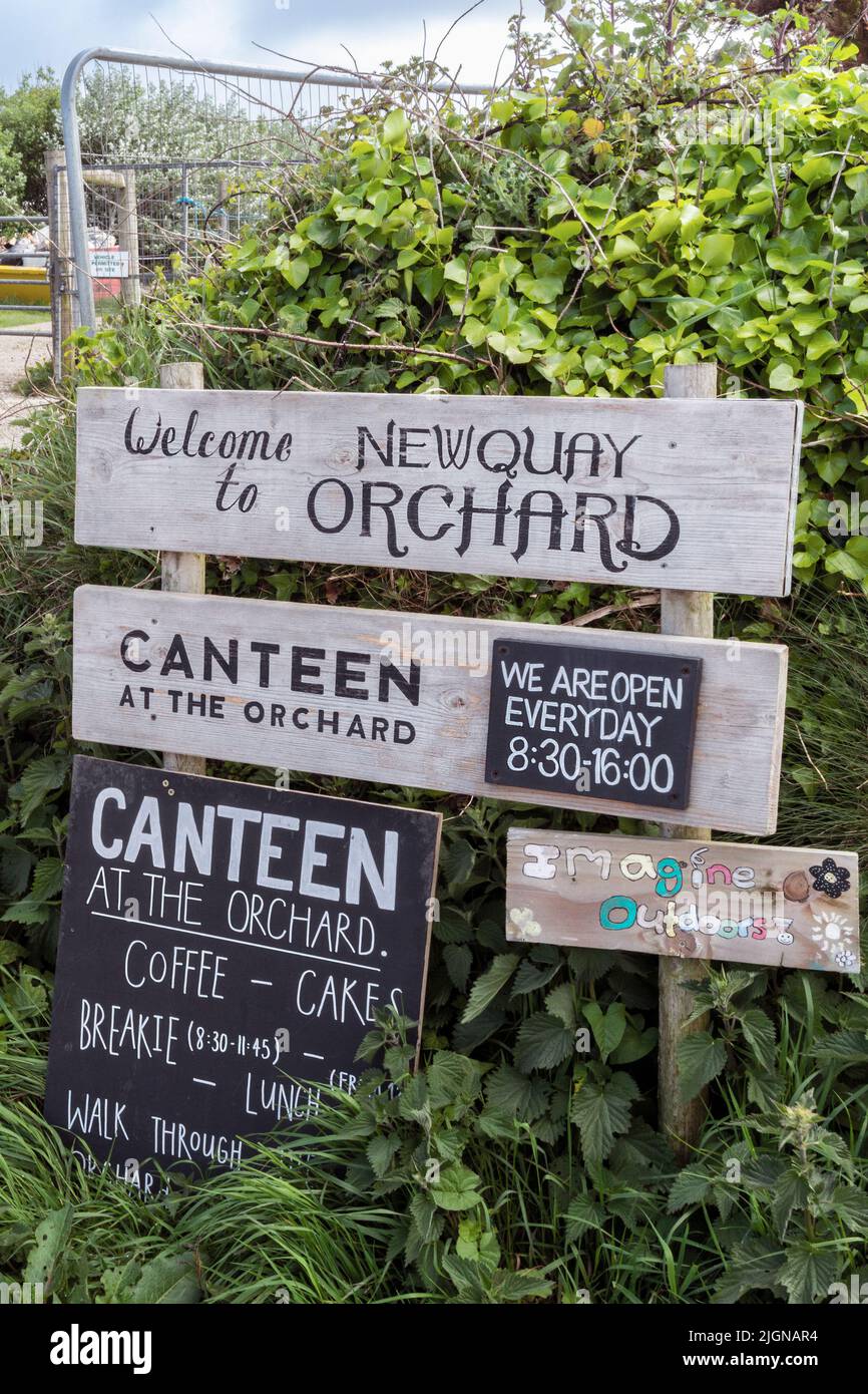 Welcome signs at Newquay Orchard a community initiative in Newquay in Cornwall in the UK. Stock Photo