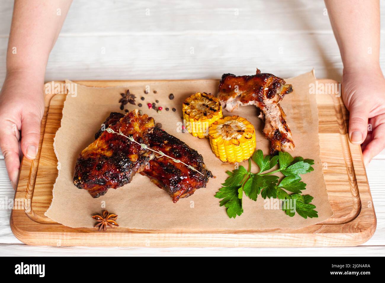 Put tray with barbecue meat on table free space Stock Photo Alamy