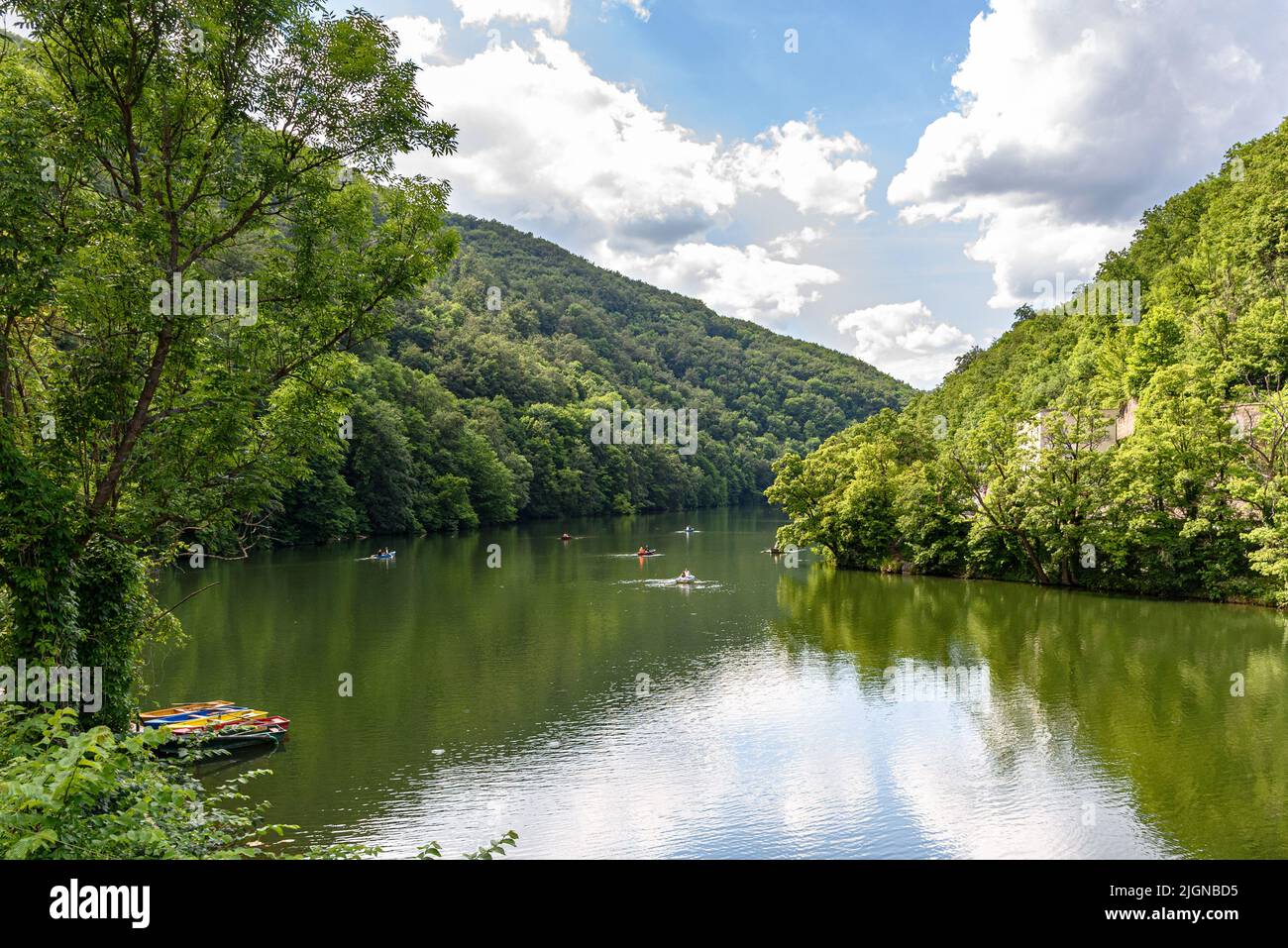 People boating on Hamori Lake in the Bukk Mountains in Lillafured, Hungary Stock Photo