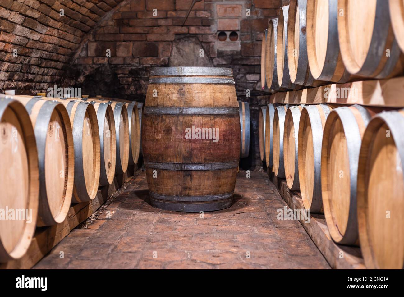 A wine cellar full of barrels of wine, alcohol concept Stock Photo Alamy