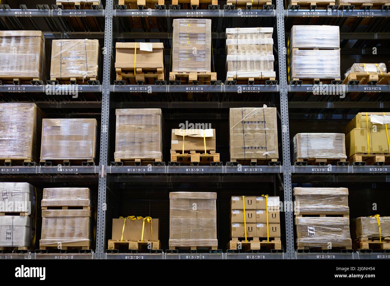 Shelving system with goods in warehouse Stock Photo