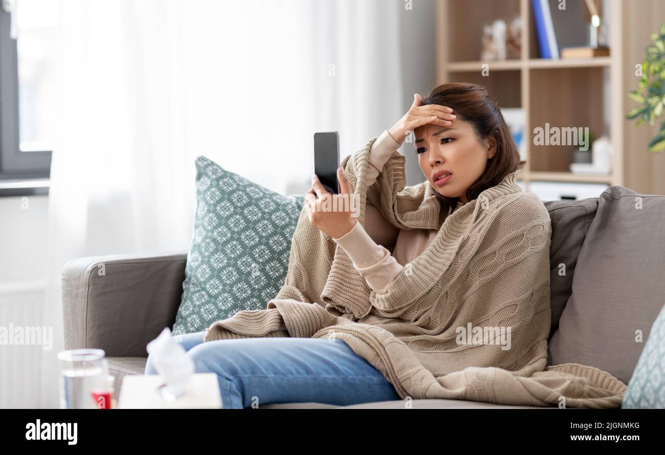 Asian woman phone headache hi-res stock photography and images - Alamy