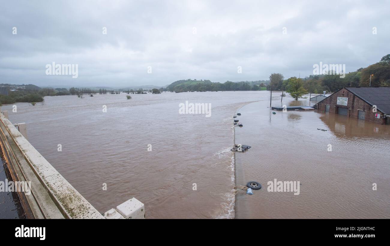 River Towy overcomes flood defences and inunbdates Ken Williams garage during Storm Callum 2018, Wales, UK Stock Photo