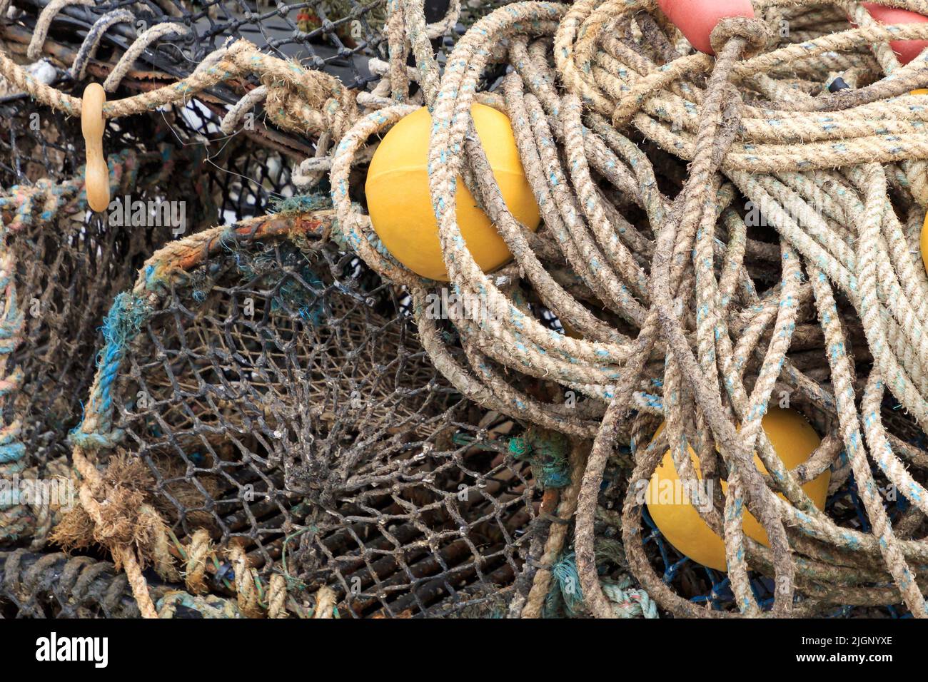 Close up on Lobster pots, Floats and rope stacked Stock Photo - Alamy