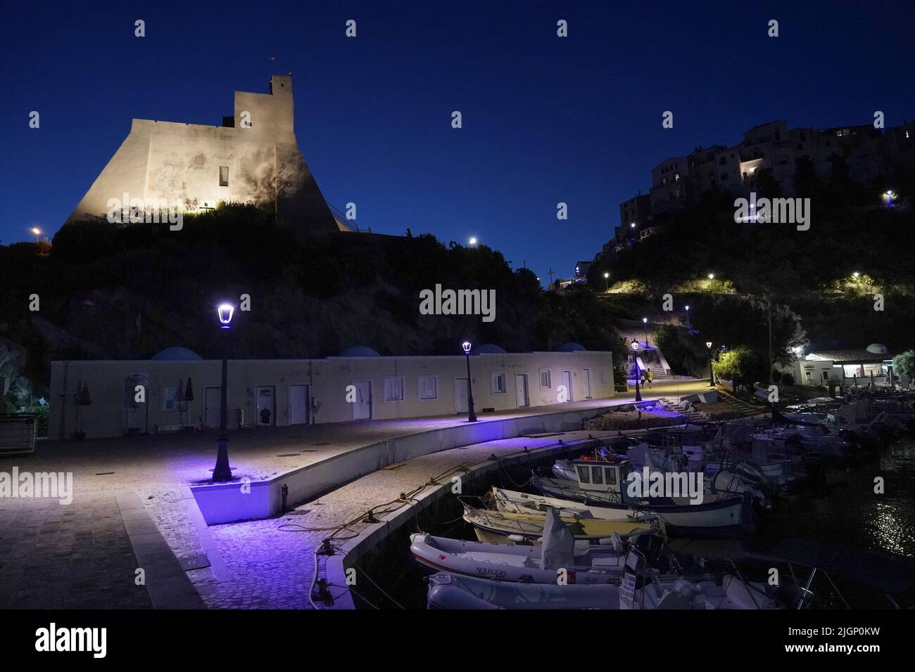 Night view of Sperlonga and the Torre Truglia tower from the port; Lazio, Italy, Europe Stock Photo