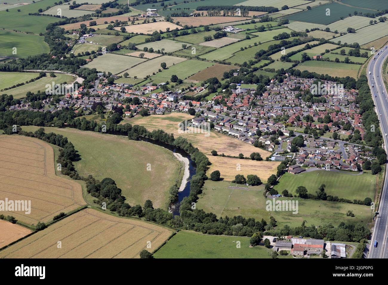 aerial view of Brompton on Swale village, North Yorkshire Stock Photo
