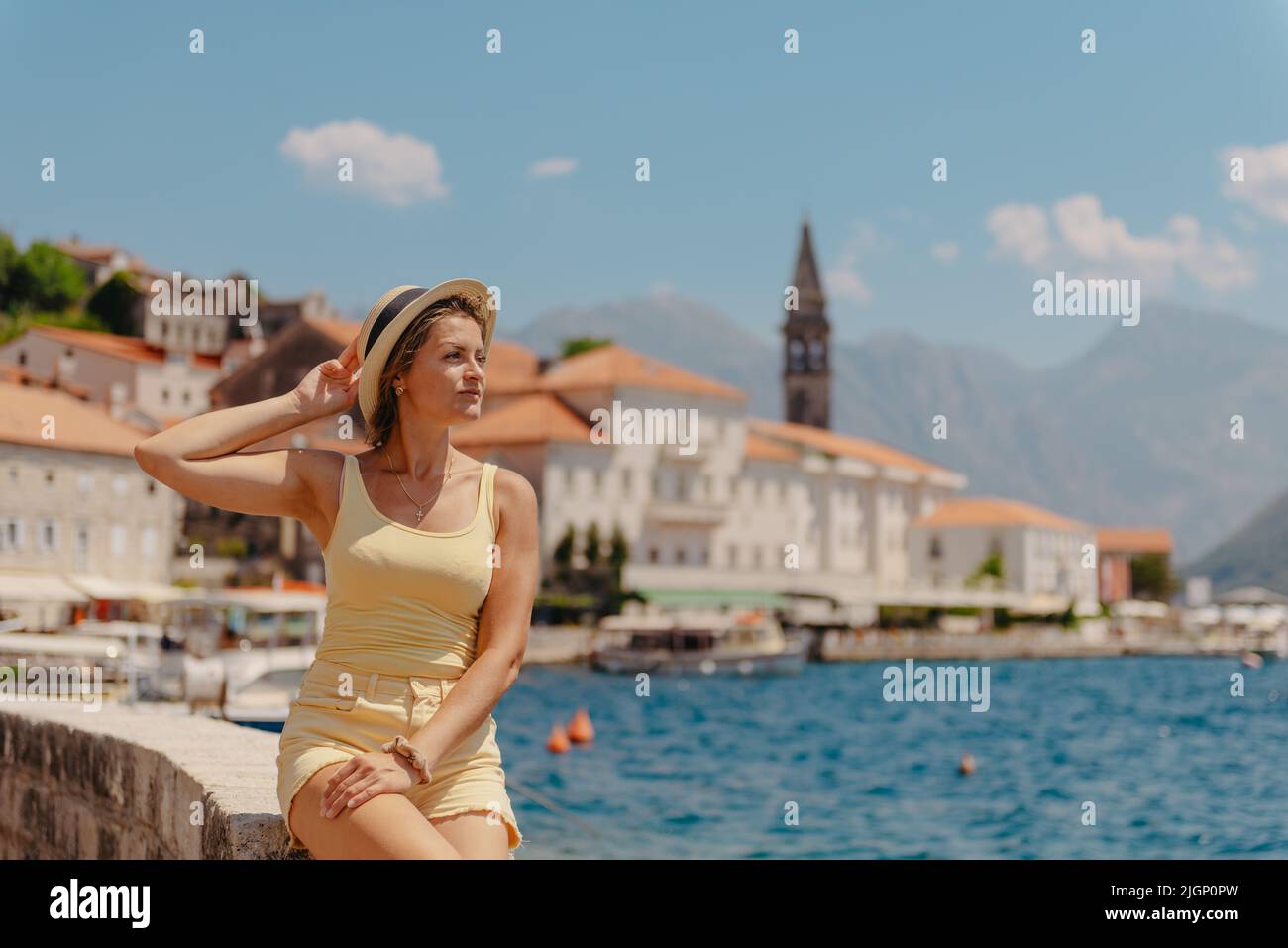 Summer photo shoot on the streets of Kotor, Montenegro. Beautiful girl