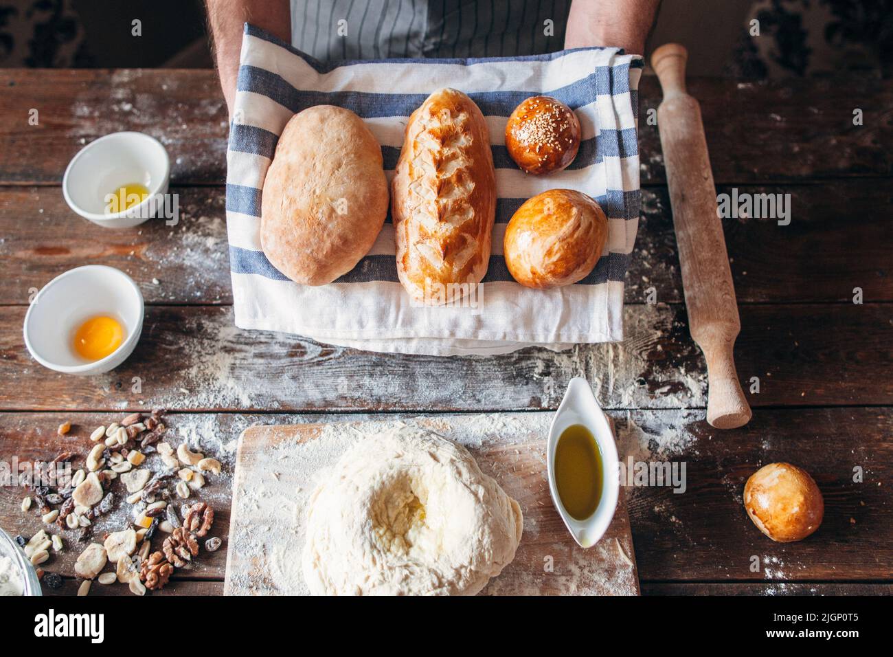 Fresh bread and baking ingredients flat lay Stock Photo