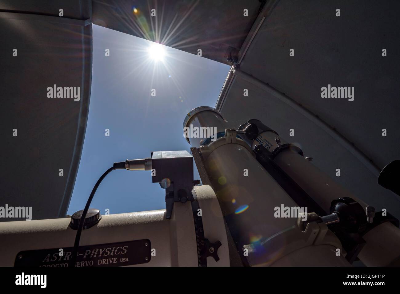 Salvador Ribas, the director of the Universe Observation Center, maneuvering a telescope at the Montsec Astronomical Park, in Àger (Lleida, Catalonia) Stock Photo