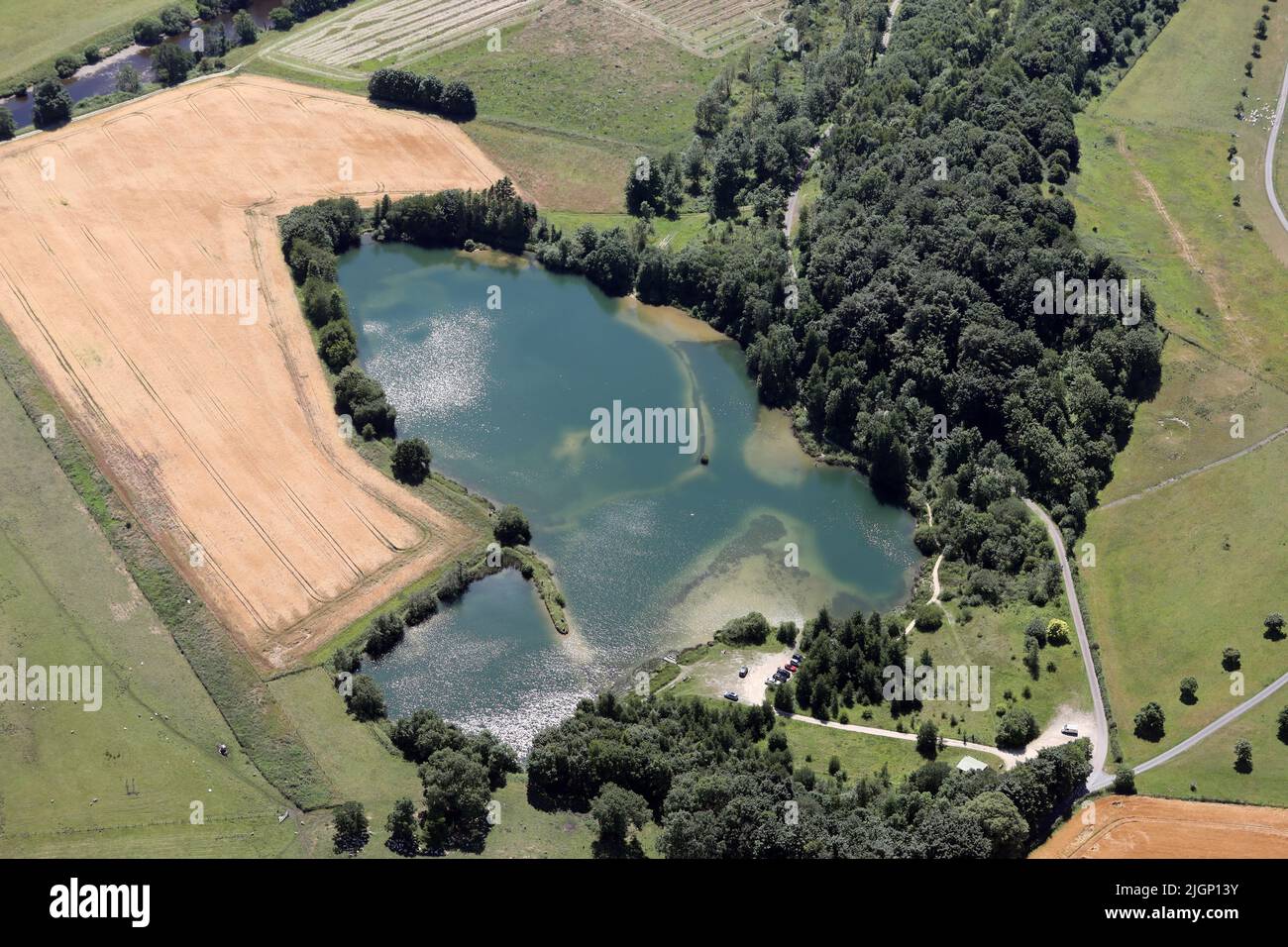 aerial vierw of Tanfield Lodge Lake, a fish farm or fishing lake near West Tanfield, North Yorkshire Stock Photo