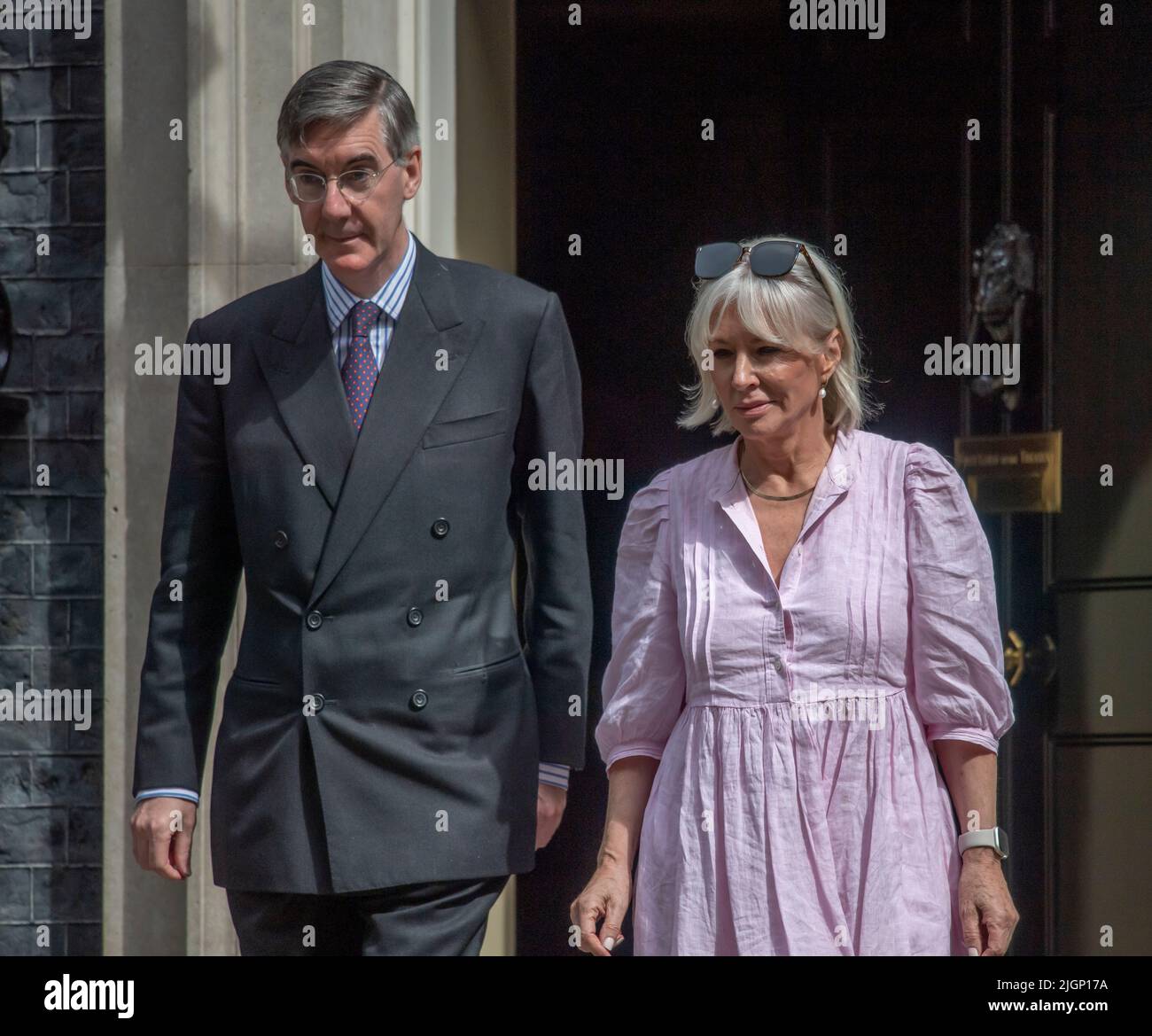 Downing Street, London, UK. 12 July 2022. Jacob Rees-Mogg (Minister of State, Minister for Brexit Opportunities and Government Efficiency) and Nadine Dorries (Secretary of State for Digital, Culture, Media and Sport) issue a joint statement outside 10 Downing Street in support of Liz Truss for Leader of the Conservative party and Prime Minister. Credit: Malcolm Park/Alamy Live News Stock Photo