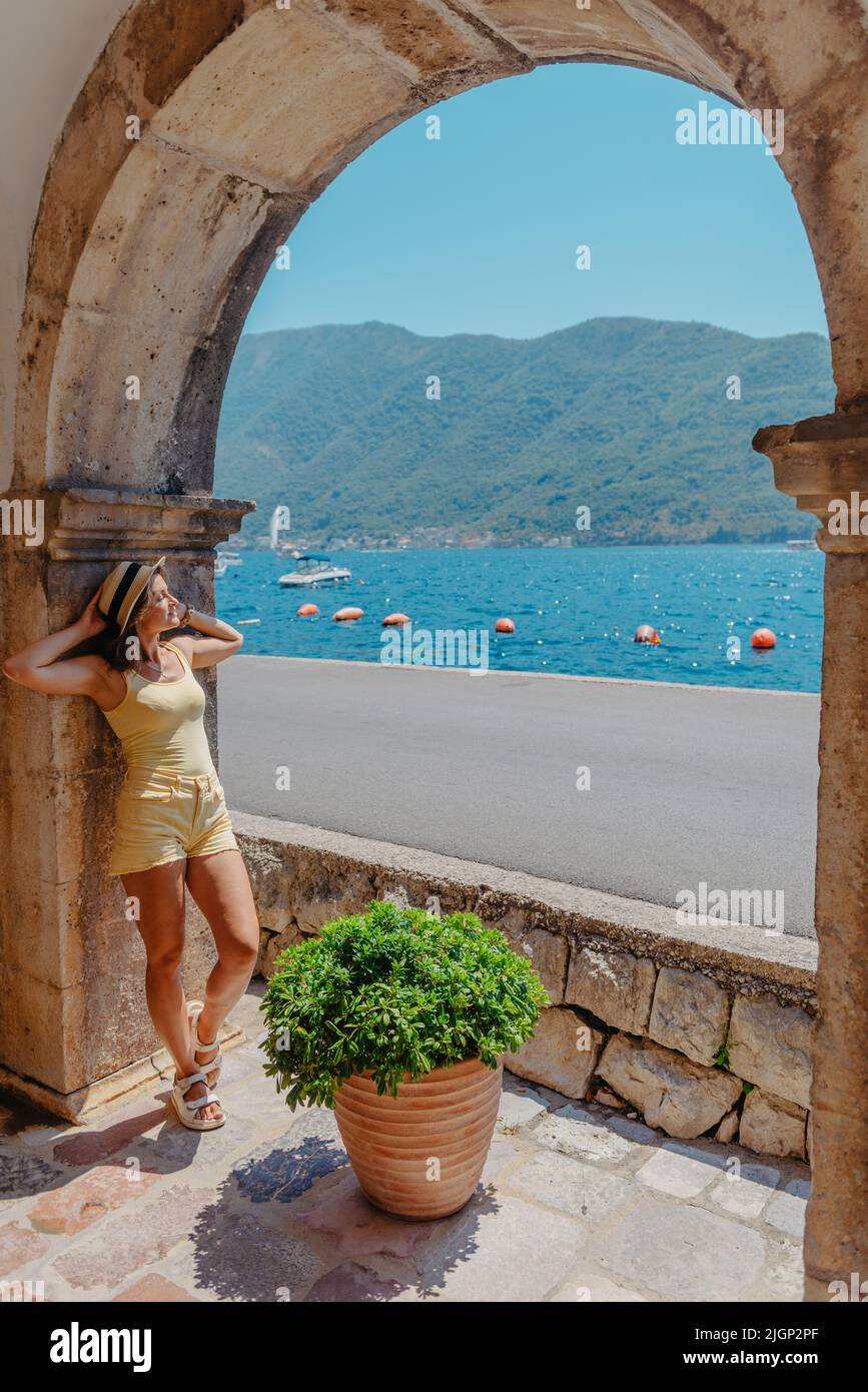 Summer photo shoot on the streets of Kotor, Montenegro. Beautiful girl