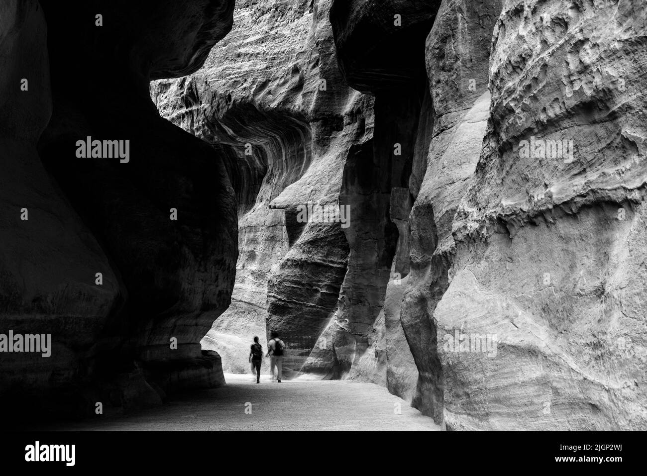 The Siq (Al Siq), A Narrow Gorge That Leads To Petra, Petra, Jordan. Stock Photo