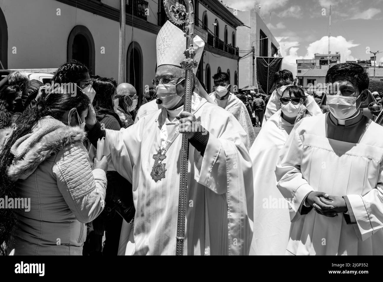 Catholic Priests Bless People In The Crowd After An Outdoor Mass In The Plaza De Armas, Puno, Puno Province, Peru. Stock Photo